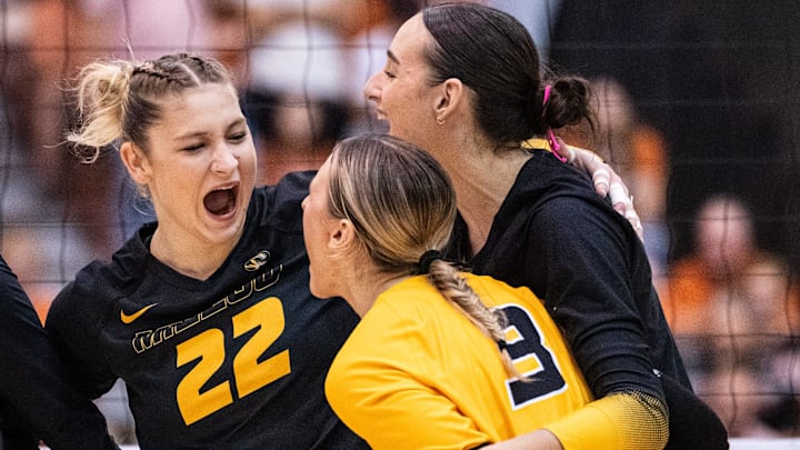 Missouri Tigers setter Marina Crownover (22), a former Texas Longhorn, reacts with her teammates, including middle blocker Morgan Isenberg (9) after scoring a point during the Longhorns' match-up with the Missouri Tigers at the Gregory Gym in Austin, Nov. 1, 2024.