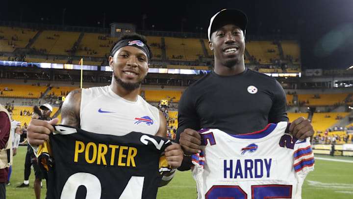 Aug 17, 2024; Pittsburgh, Pennsylvania, USA;  Buffalo Bills cornerback Daequan Hardy (left) and Pittsburgh Steelers cornerback Joey Porter Jr. (right) exchange jerseys after playing at Acrisure Stadium. Buffalo won 9-3. Mandatory Credit: Charles LeClaire-Imagn Images