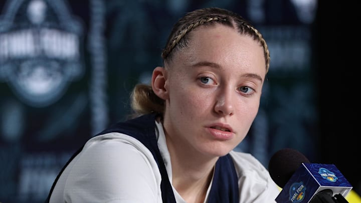 Apr 5, 2025; Tampa, FL, USA; UConn Huskies guard Paige Bueckers (5) talks to media before the NCAA Woman’s Final practice at Amalie Arena. Mandatory Credit: Nathan Ray Seebeck-Imagn Images