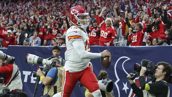 Dec 18, 2022; Houston, Texas, USA; Kansas City Chiefs quarterback Patrick Mahomes (15) runs out of the end zone after scoring a touchdown during the fourth quarter against the Houston Texans at NRG Stadium. Mandatory Credit: Troy Taormina-Imagn Images
