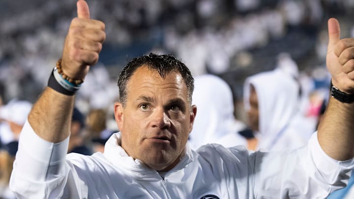 Penn State athletic director Pat Kraft gives two thumbs up to the students after a Nittany Lions win at Beaver Stadium. 