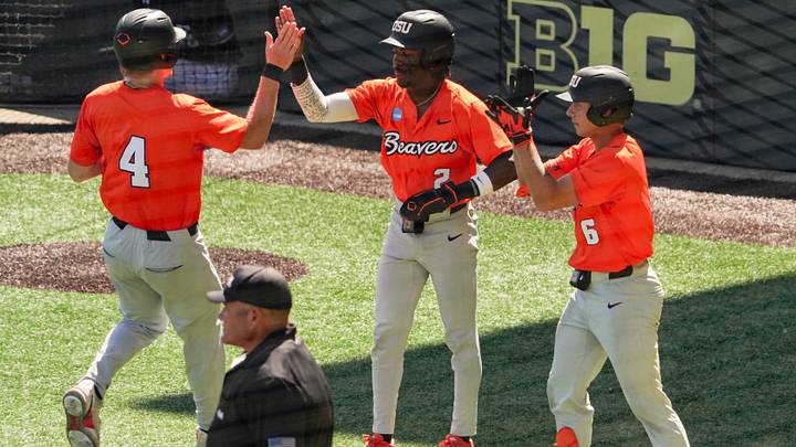 Oregon State players celebrate scoring two runs during game three of the NCAA Eugene Regional Baseball Tournament at PK Park on Saturday, May 30, 2026 in Eugene, Ore.