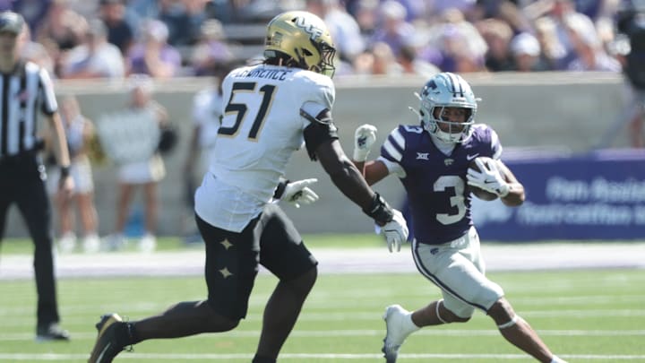 Kansas State Wildcats running back Dylan Edwards (3) runs the ball during the second half of the game against UCF Knights at Bill Snyder Family Stadium on Sept. 27, 2025.