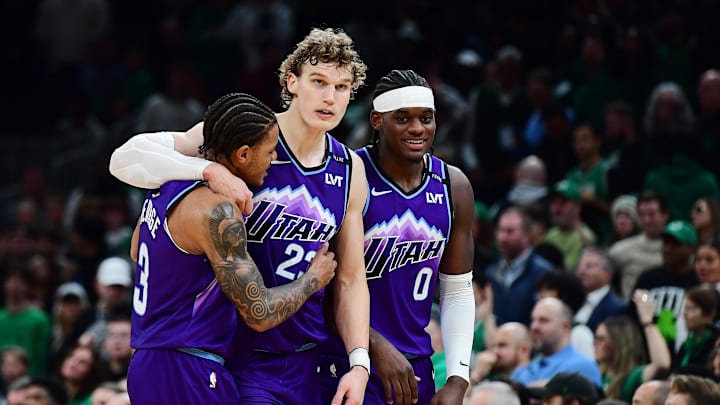 Nov 3, 2025; Boston, Massachusetts, USA; Utah Jazz guard Keyonte George (3), forward Lauri Markkanen (23), and forward Taylor Hendricks (0) react during the second half against the Boston Celtics at TD Garden. Mandatory Credit: Bob DeChiara-Imagn Images