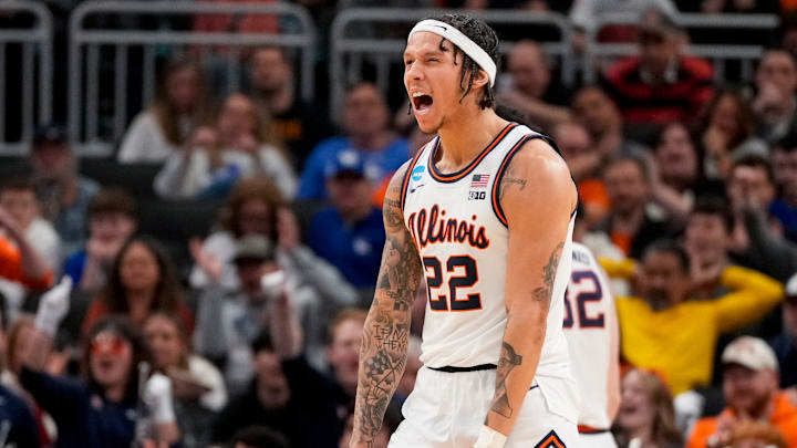 Illinois Fighting Illini guard Tre White (22) celebrates after sinking a three point basket in the second half of the NCAA Tournament First Round game between the Illinois Fighting Illini and the Xavier Musketeers at Fiserv Forum in Milwaukee on Friday, March 21, 2025. Xavier was eliminated from the tournament, losing 86-73, to Illinois. Illinois Fighting Illini guard Tre White (22) celebrates after sinking a three point basket in the second half of the NCAA Tournament First Round game between the Illinois Fighting Illini and the Xavier Musketeers at Fiserv Forum in Milwaukee on Friday, March 21, 2025. Xavier was eliminated from the tournament, losing 86-73, to Illinois.