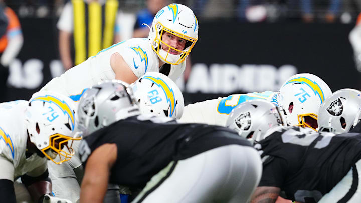 Los Angeles Chargers QB Justin Herbert looks to snap the ball against the Las Vegas Raiders.