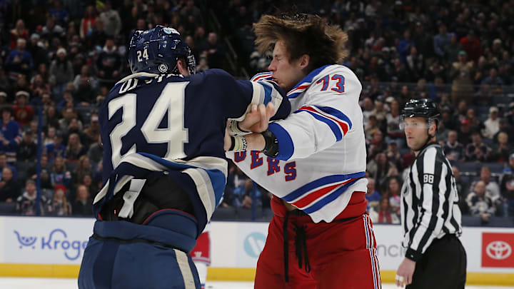 Feb 25, 2024; Columbus, Ohio, USA; Columbus Blue Jackets right wing Mathieu Olivier (24) and New