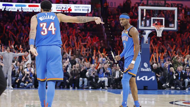 Feb 12, 2025; Oklahoma City, Oklahoma, USA; Oklahoma City Thunder guard Shai Gilgeous-Alexander (2) looks at forward Kenrich Williams (34) after he scores against the Miami Heat during the second half at Paycom Center. Mandatory Credit: Alonzo Adams-Imagn Images Feb 12, 2025; Oklahoma City, Oklahoma, USA; Oklahoma City Thunder guard Shai Gilgeous-Alexander (2) looks at forward Kenrich Williams (34) after he scores against the Miami Heat during the second half at Paycom Center. Mandatory Credit: Alonzo Adams-Imagn Images
