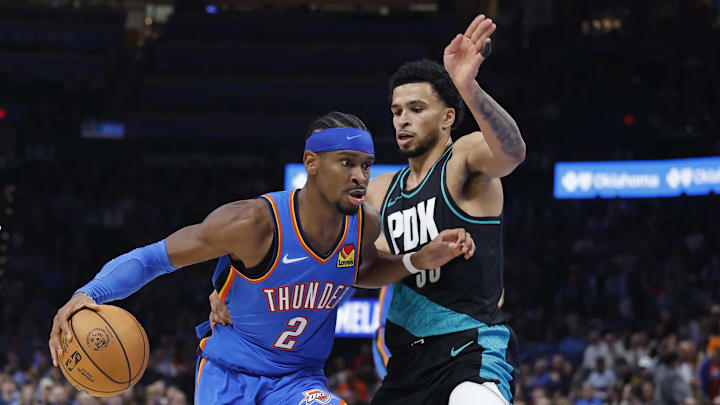 Nov 23, 2025; Oklahoma City, Oklahoma, USA; Oklahoma City Thunder guard Shai Gilgeous-Alexander (2) moves past Portland Trail Blazers forward Toumani Camara (33) during the second half at Paycom Center. Mandatory Credit: Alonzo Adams-Imagn Images Nov 23, 2025; Oklahoma City, Oklahoma, USA; Oklahoma City Thunder guard Shai Gilgeous-Alexander (2) moves past Portland Trail Blazers forward Toumani Camara (33) during the second half at Paycom Center. Mandatory Credit: Alonzo Adams-Imagn Images