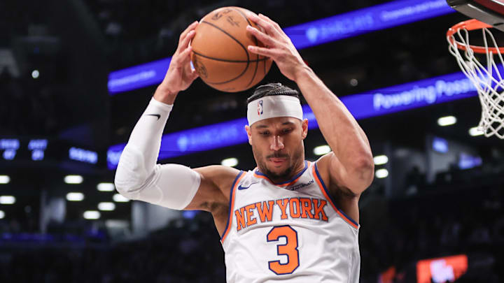 Jan 21, 2025; Brooklyn, New York, USA;  New York Knicks guard Josh Hart (3) grabs a rebound in the fourth quarter against the Brooklyn Nets at Barclays Center. Mandatory Credit: Wendell Cruz-Imagn Images