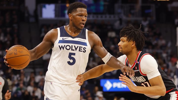Minnesota Timberwolves guard Anthony Edwards (5) works around Portland Trail Blazers guard Shaedon Sharpe in the first quarter at Target Center in Minneapolis on Nov. 8, 2024. Minnesota Timberwolves guard Anthony Edwards (5) works around Portland Trail Blazers guard Shaedon Sharpe in the first quarter at Target Center in Minneapolis on Nov. 8, 2024.