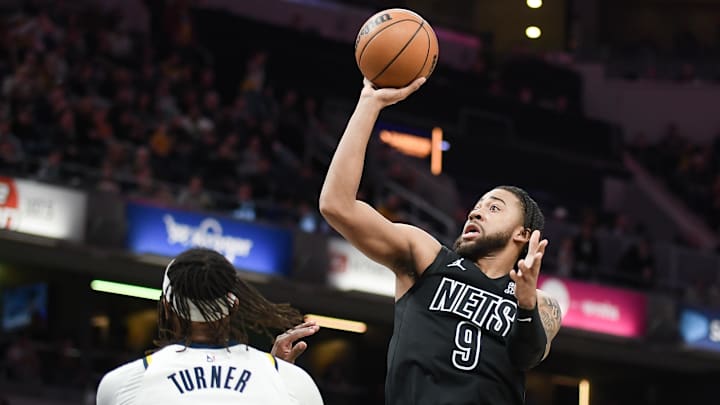 Mar 22, 2025; Indianapolis, Indiana, USA; Brooklyn Nets forward Trendon Watford (9) shoots over Indiana Pacers center Myles Turner (33) during the second half at Gainbridge Fieldhouse. Mandatory Credit: Robert Goddin-Imagn Images