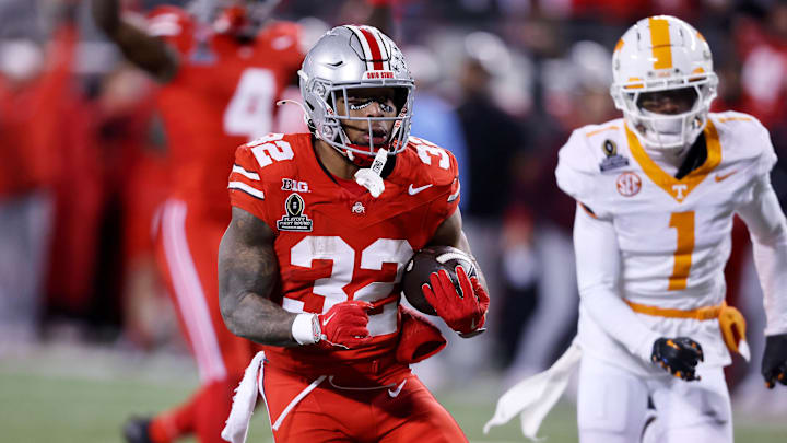 Dec 21, 2024; Columbus, Ohio, USA; Ohio State Buckeyes running back TreVeyon Henderson (32) runs the ball for a touchdown during the third quarter against the Tennessee Volunteers at Ohio Stadium. Dec 21, 2024; Columbus, Ohio, USA; Ohio State Buckeyes running back TreVeyon Henderson (32) runs the ball for a touchdown during the third quarter against the Tennessee Volunteers at Ohio Stadium.
