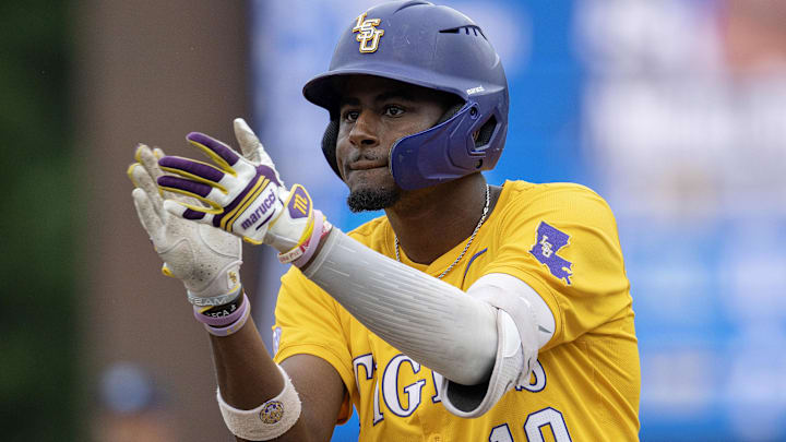 Jun 2, 2024; Chapel Hill, NC, USA;  Louisiana State Tigers infielder Michael Braswell III (10) reacts to getting a base hit against the North Carolina Tar Heels during the Div. I NCAA baseball regional at Boshamer Stadium.  Mandatory Credit: Jeffrey Camarati-Imagn Images.