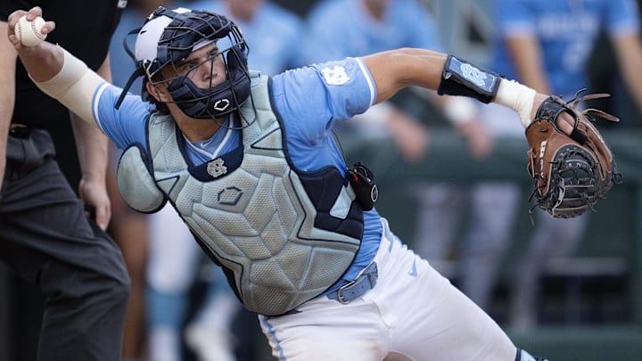 North Carolina catcher Luke Stevenson throws during an NCAA Regional Game against LSU on June 3, 2024, at Boshamer Stadium.