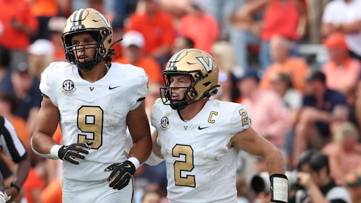 Nov 2, 2024; Auburn, Alabama, USA;  Vanderbilt Commodores quarterback Diego Pavia (2) celebrates with tight end Eli Stowers (9) after a touchdown during the fourth quarter against the Auburn Tigers at Jordan-Hare Stadium. Mandatory Credit: John Reed-Imagn Images