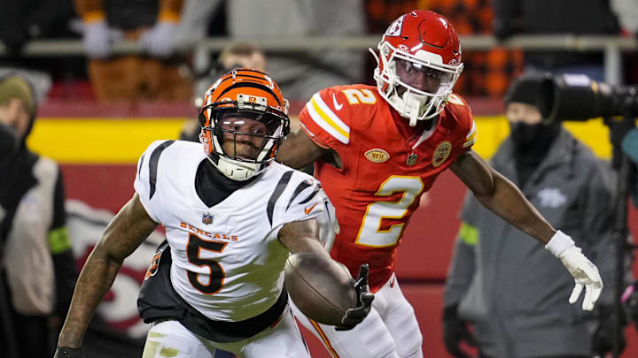 Dec 31, 2023; Kansas City, Missouri, USA; Cincinnati Bengals wide receiver Tee Higgins (5) is unable to make the catch as Kansas City Chiefs cornerback Joshua Williams (2) defends during the second half at GEHA Field at Arrowhead Stadium. Mandatory Credit: Jay Biggerstaff-Imagn Images