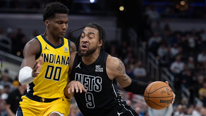 Mar 20, 2025; Indianapolis, Indiana, USA; Brooklyn Nets forward Trendon Watford (9) dribbles the ball while Indiana Pacers guard Bennedict Mathurin (00) defends in the second half at Gainbridge Fieldhouse. Mandatory Credit: Trevor Ruszkowski-Imagn Images Mar 20, 2025; Indianapolis, Indiana, USA; Brooklyn Nets forward Trendon Watford (9) dribbles the ball while Indiana Pacers guard Bennedict Mathurin (00) defends in the second half at Gainbridge Fieldhouse. Mandatory Credit: Trevor Ruszkowski-Imagn Images