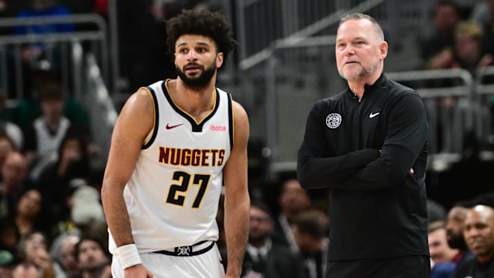 Feb 27, 2025; Milwaukee, Wisconsin, USA: Denver Nuggets head coach Michael Malone and guard Jamal Murray (27) look on in the fourth quarter against the Milwaukee Bucks at Fiserv Forum. Mandatory Credit: Benny Sieu-Imagn Images