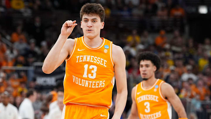 Tennessee forward J.P. Estrella (13) signals a close shot during the NCAA Tournament Elite 8 game against Michigan at the United Center in Chicago on March 29, 2026.