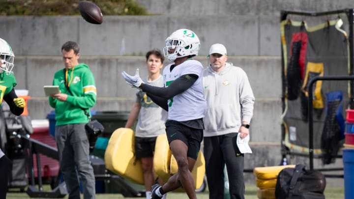 Oregon wide receiver Evan Stewart hauls in a pass during practice with the Ducks Thursday, April 11, 2024, at the Hatfield-Dowlin Complex in Eugene, Ore.