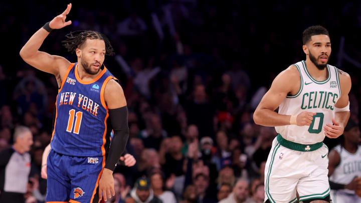 New York Knicks guard Jalen Brunson (11) celebrates his three point shot against Boston Celtics forward Jayson Tatum.
