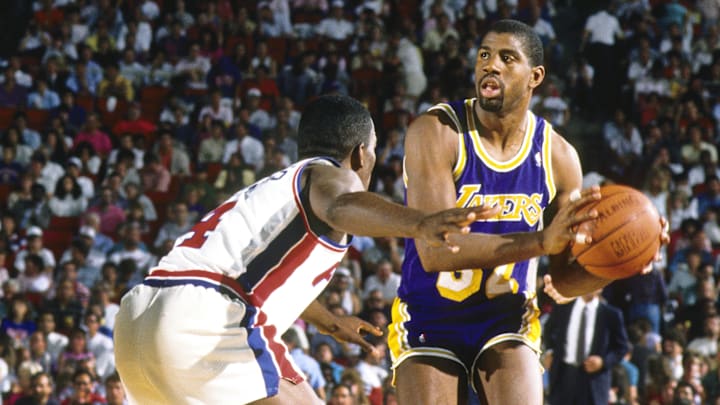Jun 1988; Detroit, MI, USA; FILE PHOTO; Los Angeles Lakers guard Magic Johnson (32) is defended by Detroit Pistons guard Joe Dumars (4) during the 1988 NBA Finals at the Silverdome. Mandatory Credit: MPS-Imagn Images Jun 1988; Detroit, MI, USA; FILE PHOTO; Los Angeles Lakers guard Magic Johnson (32) is defended by Detroit Pistons guard Joe Dumars (4) during the 1988 NBA Finals at the Silverdome. Mandatory Credit: MPS-Imagn Images