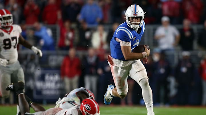 Nov 9, 2024; Oxford, Mississippi, USA; Mississippi Rebels quarterback Jaxson Dart (2) runs the ball during the second half against the Georgia Bulldogs at Vaught-Hemingway Stadium. Mandatory Credit: Petre Thomas-Imagn Images Nov 9, 2024; Oxford, Mississippi, USA; Mississippi Rebels quarterback Jaxson Dart (2) runs the ball during the second half against the Georgia Bulldogs at Vaught-Hemingway Stadium. Mandatory Credit: Petre Thomas-Imagn Images
