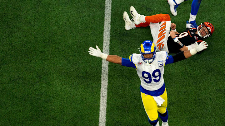 Los Angeles Rams defensive end Aaron Donald (99) celebrates after hitting Cincinnati Bengals quarterback Joe Burrow (9) as he threw on fourth down forcing a turnover on downs with the less than a minute to play in 4th quarter during Super Bowl 56, Sunday, Feb. 13, 2022, at SoFi Stadium in Inglewood, Calif.

Nfl Super Bowl 56 Los Angeles Rams Vs Cincinnati Bengals Feb 13 2022 Albert Cesare 2686