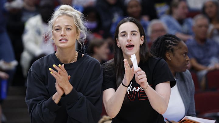 Jun 7, 2025; Chicago, Illinois, USA; Injured Indiana Fever guard Sophie Cunningham (8) and guard Caitlin Clark (22) react from the bench during the first half of a WNBA game against the Chicago Sky at United Center. Mandatory Credit: Kamil Krzaczynski-Imagn Images Jun 7, 2025; Chicago, Illinois, USA; Injured Indiana Fever guard Sophie Cunningham (8) and guard Caitlin Clark (22) react from the bench during the first half of a WNBA game against the Chicago Sky at United Center. Mandatory Credit: Kamil Krzaczynski-Imagn Images