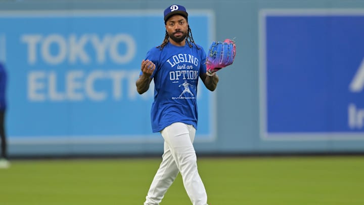Oct 26, 2025; Los Angeles, CA, USA; Los Angeles Dodgers center fielder Justin Dean (75) takes ground balls during World Series workouts prior to game three against the Toronto Blue Jays at Dodger Stadium. Mandatory Credit: Jayne Kamin-Oncea-Imagn Images Oct 26, 2025; Los Angeles, CA, USA; Los Angeles Dodgers center fielder Justin Dean (75) takes ground balls during World Series workouts prior to game three against the Toronto Blue Jays at Dodger Stadium. Mandatory Credit: Jayne Kamin-Oncea-Imagn Images