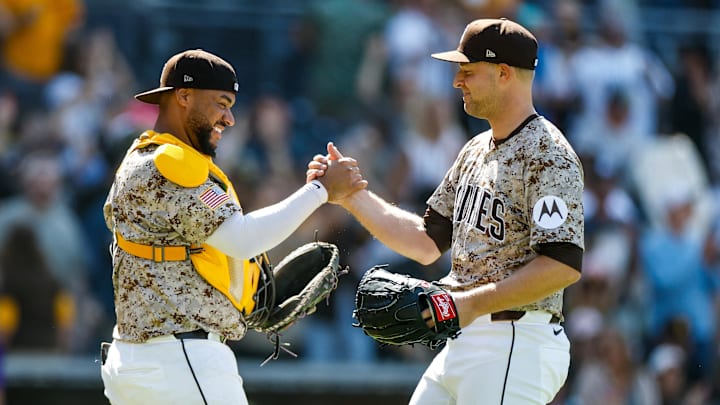 Apr 13, 2025; San Diego, California, USA; San Diego Padres starting pitcher Michael King (34) celebrates with San Diego Padres catcher Elias Diaz (17) after throwing a complete-game two hit shutout against the Colorado Rockies at Petco Park. Mandatory Credit: David Frerker-Imagn Images