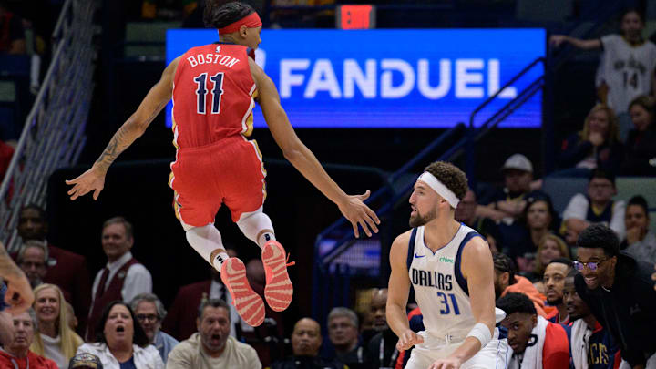 Jan 29, 2025; New Orleans, Louisiana, USA; Dallas Mavericks guard Klay Thompson (31) controls the ball against New Orleans Pelicans guard Brandon Boston (11) during the second half at Smoothie King Center. Mandatory Credit: Matthew Hinton-Imagn Images