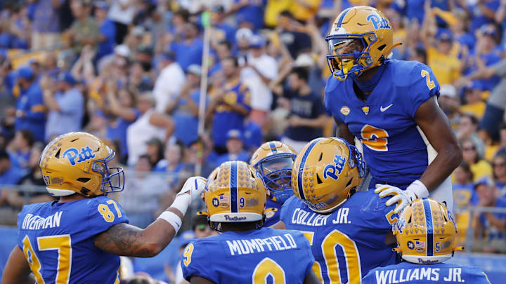 Sep 21, 2024; Pittsburgh, Pennsylvania, USA; Pittsburgh Panthers wide receiver Kenny Johnson (2) celebrates with teammates after scoring a touchdown against the Youngstown State Penguins during the second quarter at Acrisure Stadium. Mandatory Credit: Charles LeClaire-Imagn Images