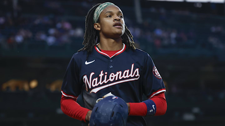 Sep 19, 2024; Chicago, Illinois, USA; Washington Nationals shortstop CJ Abrams (5) smiles after scoring against the Chicago Cubs during the first inning at Wrigley Field. 