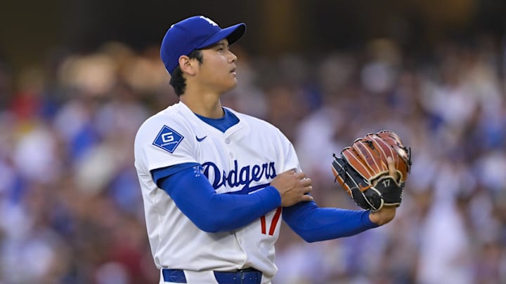 Jun 16, 2025; Los Angeles, California, USA; Los Angeles Dodgers designated hitter Shohei Ohtani (17) between pitches during the first inning against the San Diego Padres at Dodger Stadium. Mandatory Credit: Jayne Kamin-Oncea-Imagn Images