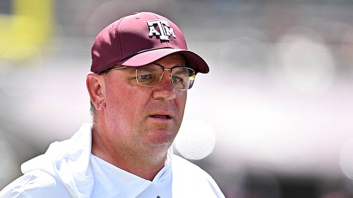 Texas A&M Aggies head coach Mike Elko walk on the field prior to the game against the Kentucky Wildcats at Kyle Field. Texas A&M Aggies head coach Mike Elko walk on the field prior to the game against the Kentucky Wildcats at Kyle Field.