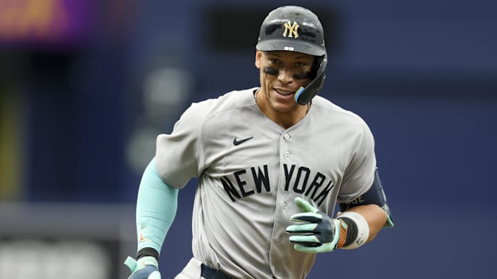 Apr 12, 2026; St. Petersburg, Florida, USA; New York Yankees designated hitter Aaron Judge (99) reacts after hitting a two run home run against the Tampa Bay Rays in the ninth inning at Tropicana Field. Mandatory Credit: Nathan Ray Seebeck-Imagn Images