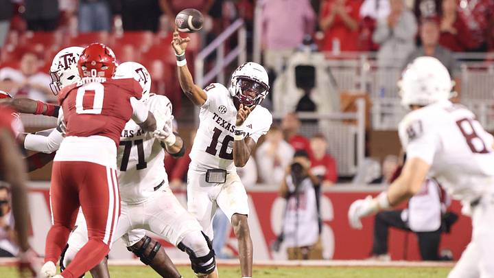 Oct 18, 2025; Fayetteville, Arkansas, USA; Texas A&M Aggies quarterback Marcel Reed (10) passes in the fourth quarter against the Arkansas Razorbacks at Donald W. Reynolds Razorback Stadium. Mandatory Credit: Nelson Chenault-Imagn Images