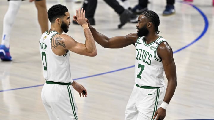 Jun 12, 2024; Dallas, Texas, USA; Boston Celtics forward Jayson Tatum (0) and guard Jaylen Brown (7) celebrate after a play during the first quarter in game three of the 2024 NBA Finals against the Dallas Mavericks at American Airlines Center. Mandatory Credit: Jerome Miron-USA TODAY Sports Jun 12, 2024; Dallas, Texas, USA; Boston Celtics forward Jayson Tatum (0) and guard Jaylen Brown (7) celebrate after a play during the first quarter in game three of the 2024 NBA Finals against the Dallas Mavericks at American Airlines Center. Mandatory Credit: Jerome Miron-USA TODAY Sports
