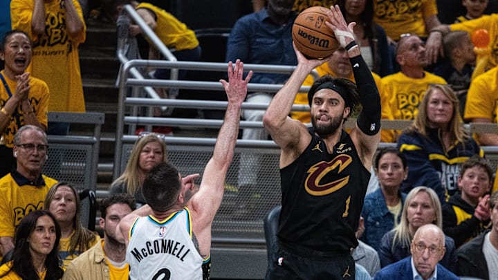 May 9, 2025; Indianapolis, Indiana, USA; Cleveland Cavaliers guard Max Strus (1) shoots the ball while  Indiana Pacers guard T.J. McConnell (9) defends during game three of the second round for the 2025 NBA Playoffs at Gainbridge Fieldhouse. Mandatory Credit: Trevor Ruszkowski-Imagn Images