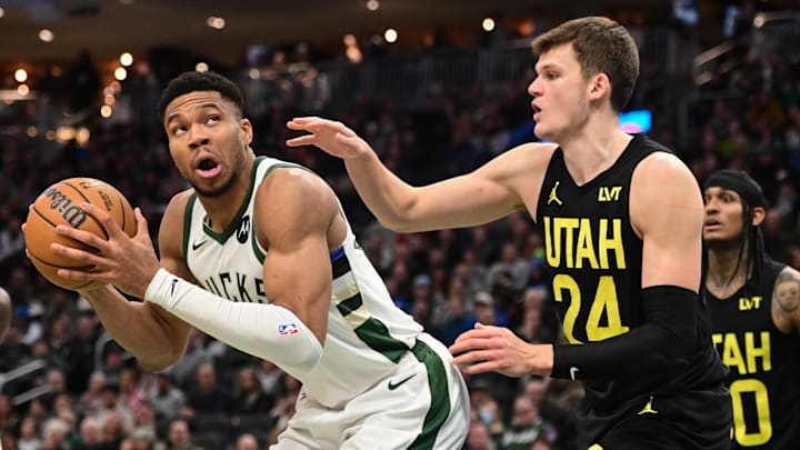 Jan 8, 2024; Milwaukee, Wisconsin, USA;  Milwaukee Bucks forward Giannis Antetokounmpo (34) looks for a shot against Utah Jazz center Walker Kessler (24) in the fourth quarter at Fiserv Forum. Mandatory Credit: Benny Sieu-Imagn Images