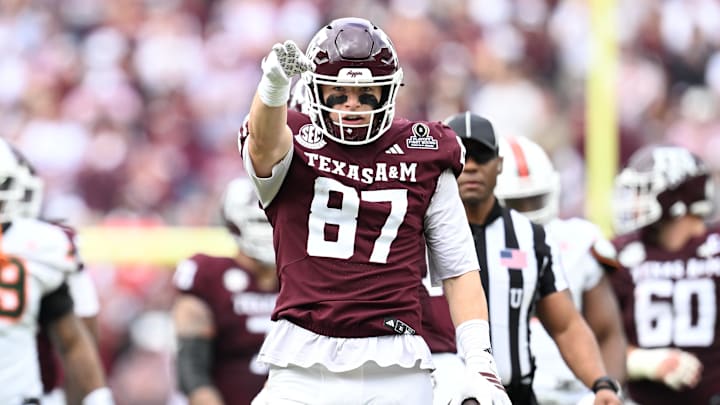 Texas A&M Aggies tight end Nate Boerkircher celebrates a first down against the Miami Hurricanes during the first quarter of the first round game of the CFP at Kyle Field.