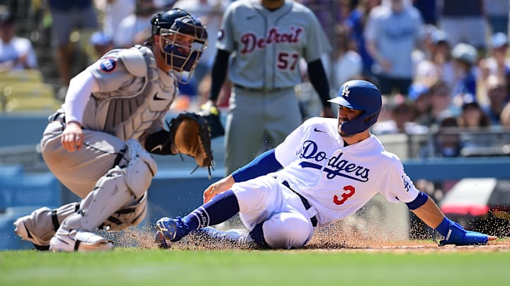 May 1, 2022; Los Angeles, California, USA; Los Angeles Dodgers left fielder Chris Taylor (3) scores a run ahead of Detroit Tigers catcher Tucker Barnhart (15) during the sixth inning at Dodger Stadium. Mandatory Credit: Gary A. Vasquez-Imagn Images May 1, 2022; Los Angeles, California, USA; Los Angeles Dodgers left fielder Chris Taylor (3) scores a run ahead of Detroit Tigers catcher Tucker Barnhart (15) during the sixth inning at Dodger Stadium. Mandatory Credit: Gary A. Vasquez-Imagn Images