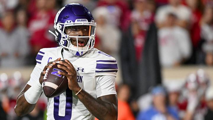Sep 25, 2026; Bloomington, Indiana, USA; Northwestern Wildcats quarterback Aidan Chiles (0) looks to throw a pass against the Indiana Hoosiers during the second half at Merchants Bank Field at Memorial Stadium. Mandatory Credit: Robert Goddin-Imagn Images Sep 25, 2026; Bloomington, Indiana, USA; Northwestern Wildcats quarterback Aidan Chiles (0) looks to throw a pass against the Indiana Hoosiers during the second half at Merchants Bank Field at Memorial Stadium. Mandatory Credit: Robert Goddin-Imagn Images