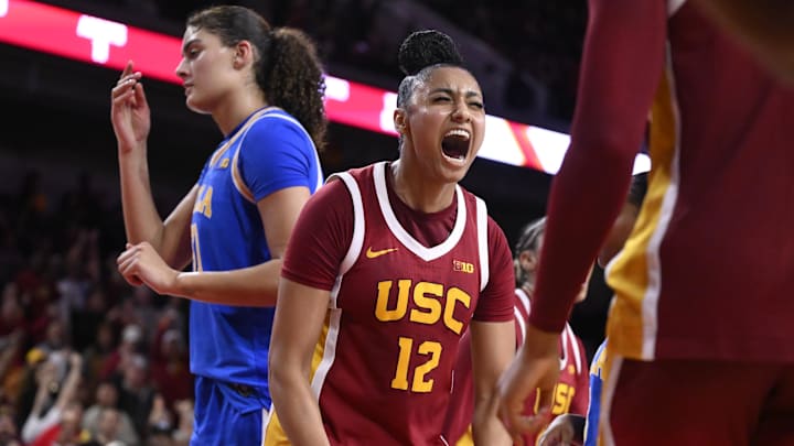 Feb 13, 2025; Los Angeles, California, USA; USC Trojans guard JuJu Watkins (12) reacts after scoring in the fourth quarter against the UCLA Bruins at Galen Center. Mandatory Credit: Robert Hanashiro-Imagn Images