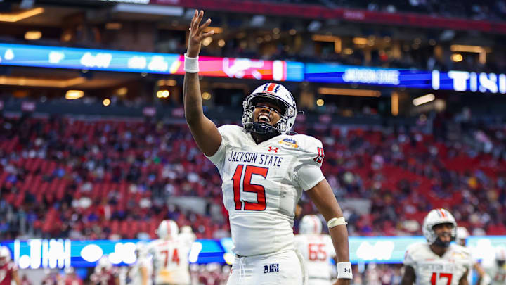 Dec 14, 2024; Atlanta, GA, USA; Jackson State Tigers quarterback Jacobian Morgan (15) celebrates after a touchdown pass against the South Carolina State Bulldogs in the fourth quarter at Mercedes-Benz Stadium. Mandatory Credit: Brett Davis-Imagn Images

