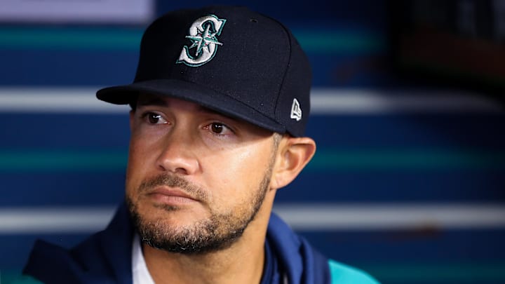 Apr 20, 2022; Seattle, Washington, USA; Seattle Mariners acting manager Kristopher Negron (45) stands in the dugout before his first game in the position due to manager Scott Servais testing positive for COVID-19 earlier in the day before the game against the Texas Rangers at T-Mobile Park. Mandatory Credit: Lindsey Wasson-Imagn Images Apr 20, 2022; Seattle, Washington, USA; Seattle Mariners acting manager Kristopher Negron (45) stands in the dugout before his first game in the position due to manager Scott Servais testing positive for COVID-19 earlier in the day before the game against the Texas Rangers at T-Mobile Park. Mandatory Credit: Lindsey Wasson-Imagn Images