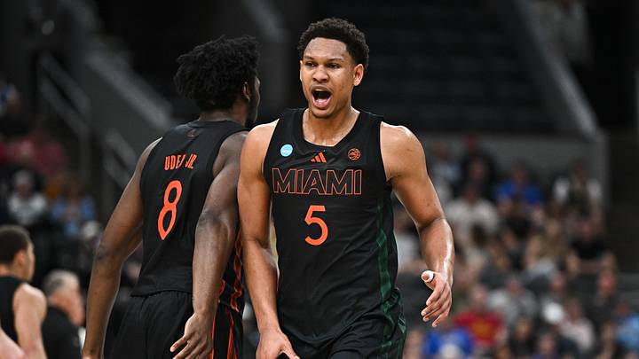 Mar 22, 2026; St. Louis, MO, USA; Miami Hurricanes forward Malik Reneau (5) celebrates with Miami Hurricanes center Ernest Udeh Jr. (8) after a play during the first half against the Purdue Boilermakers during a second round game of the men's 2026 NCAA Tournament at Enterprise Center. Mandatory Credit: Jeff Le-Imagn Images