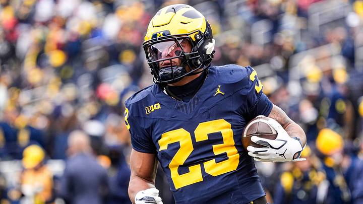 Michigan running back Jordan Marshall (23) warms up at Michigan Stadium in Ann Arbor on Saturday, Nov. 29, 2025.